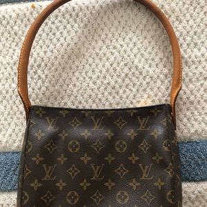 Louis Vuitton handbag authentic.